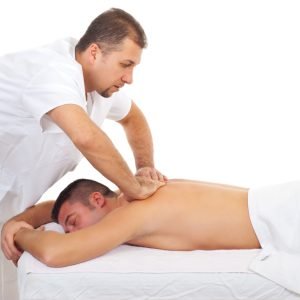 Real,Professional,Masseur,Massaging,Man,Back,At,Spa,Salon