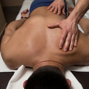 Masseur,Doing,Massage,On,Man,Body,In,The,Spa,Salon